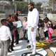 Nipsey Hussle greets kids at the Nipsey Hussle x PUMA Hoops Basketball Court Refurbishment Reveal Event on Oct. 22, 2018, in Los Angeles.